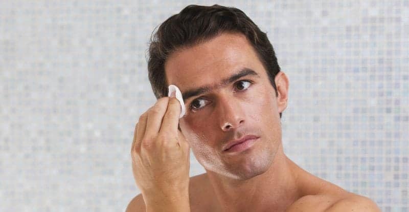 Man Cleaning Face