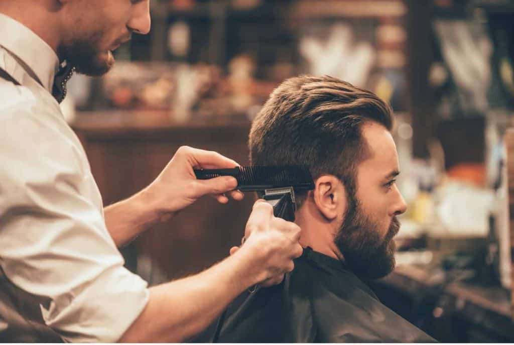 Man Getting Haircut At San Diego Barbershop