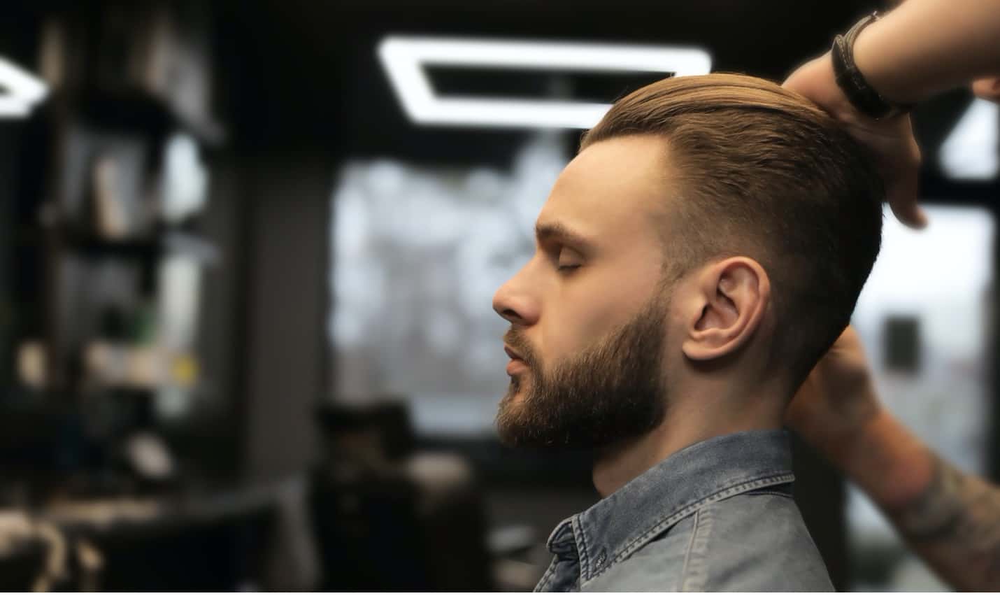 Man Getting Hair Styled In Salon