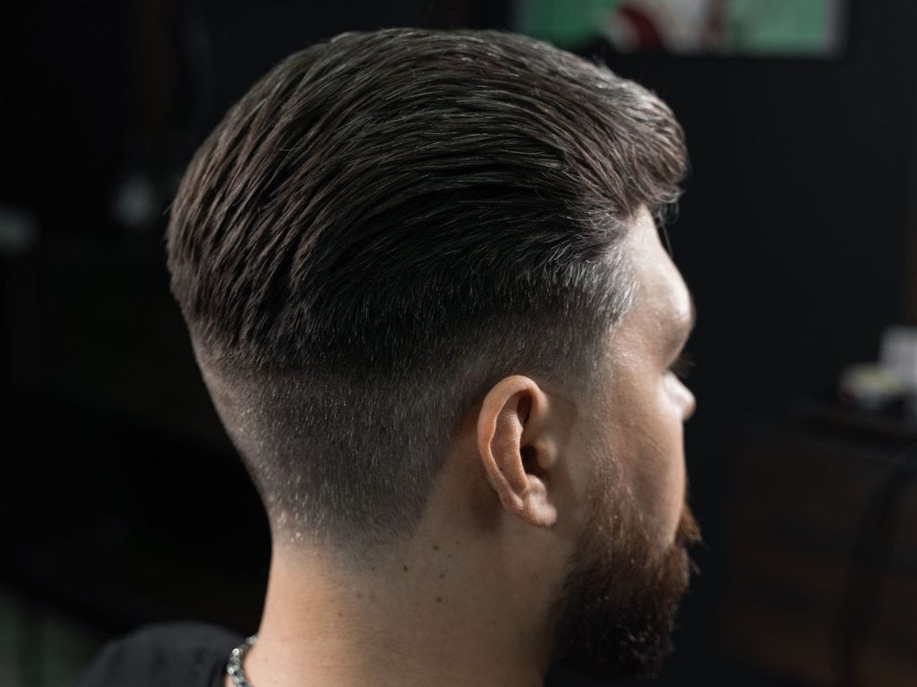 The back of a low fade men's haircut